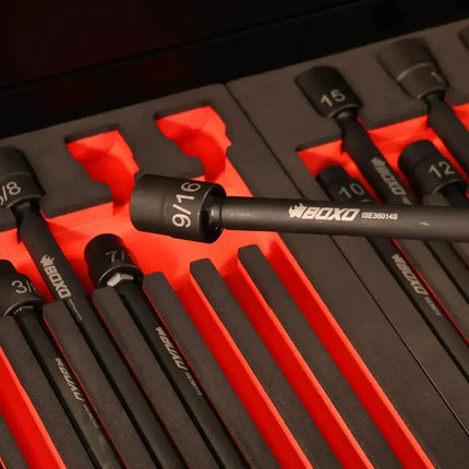 Close-up of a BoxoUSA 9/16 inch universal impact extension socket held above its two-tone EVA foam insert